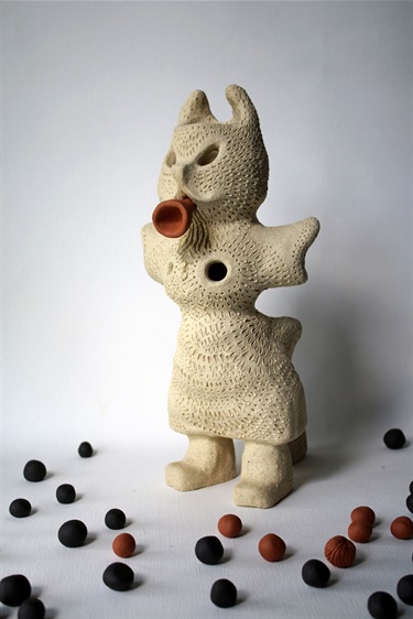 Mai Nguyen-Long, “Warrior Cat with Poo Balls” (detail from “Warrior Cat + Doba”), 2017-2023, unglazed and glazed clay