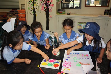 Children colouring and painting