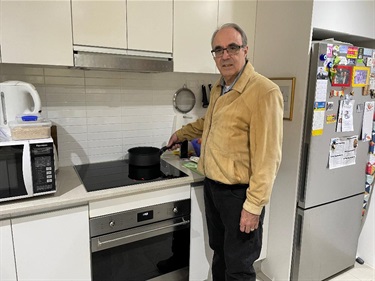 Brian Peck with induction cooktop