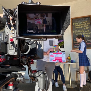 Filming of The Inaccurate Perception of Lara Grace with actress Shae Beadman at the Bond’s Corner Café in Northbridge, courtesy of Natalia Stawyskyj