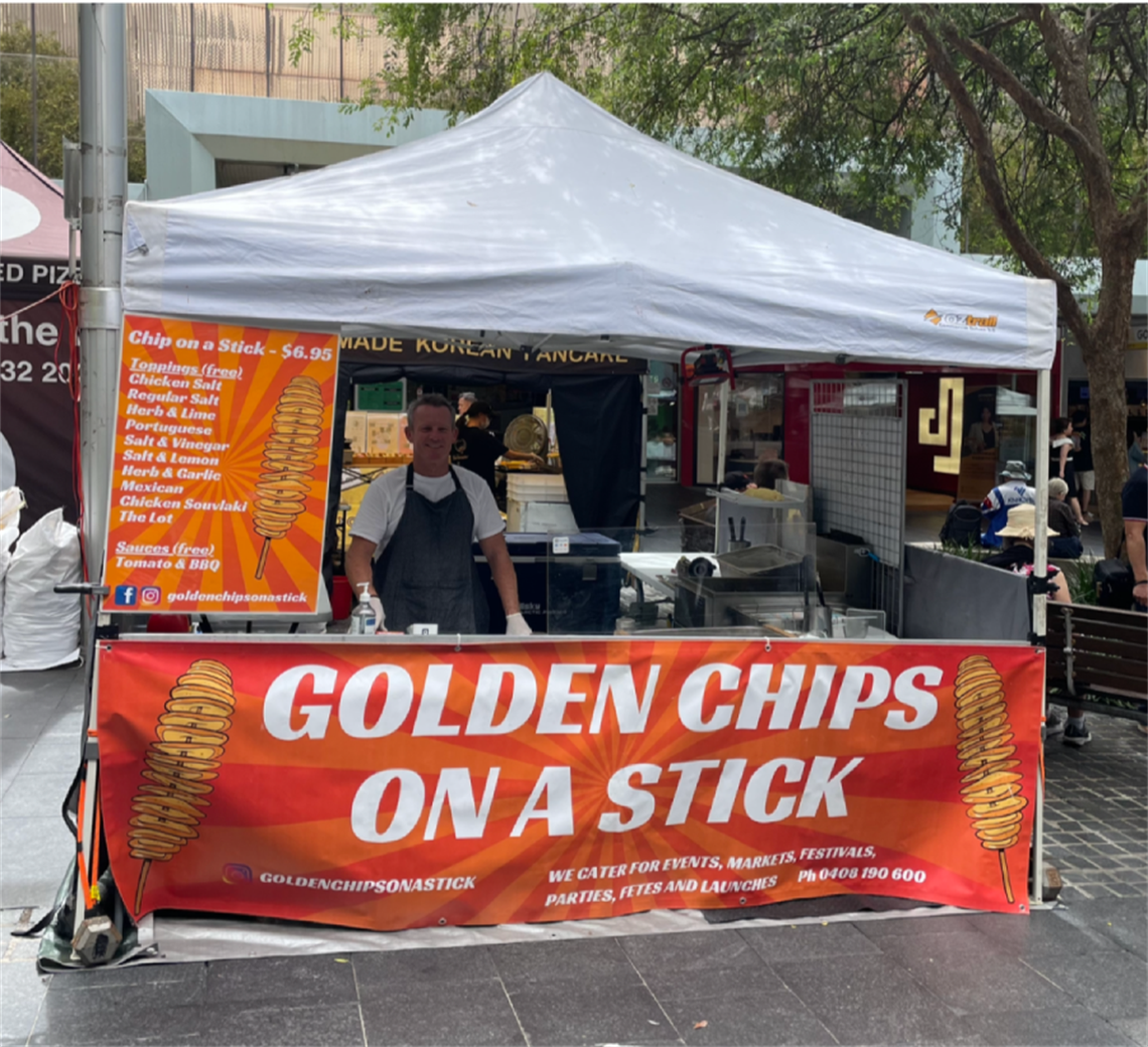 Golden Chips on a Stick - stall.PNG